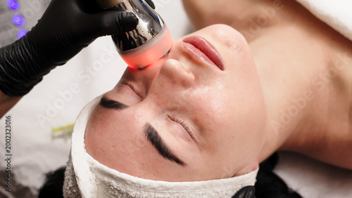 Canvas Print Professional RF lifting session in modern aesthetic clinic
