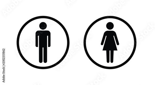 Canvas Print Male and female restroom signs in circles black silhouette