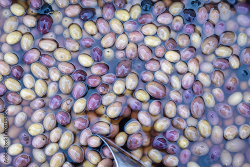 Canvas Print Brine cured green and purple olives