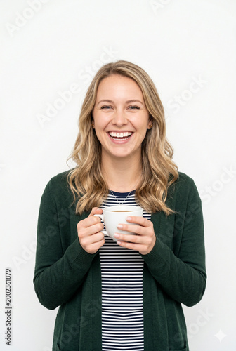 Portrait of a happy young caucasian woman drinking coffee isolated on white background