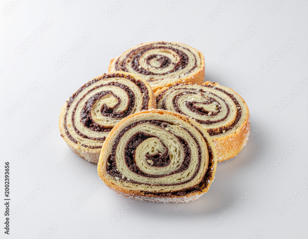 Fototapeta premium Group of rugelach pastries with chocolate filling isolated on white background