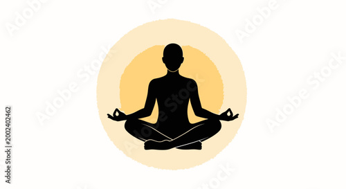 Silhouette of person meditating in lotus pose with glowing aura