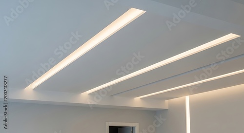Modern Minimalist White Ceiling with Recessed Linear LED Lighting