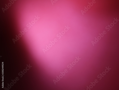 Una toma de cerca de un fondo abstracto de  color rosado con un degradado ligero desenfocado