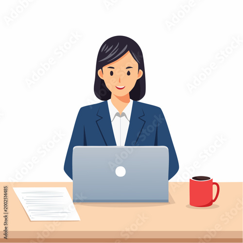 デスクでノートパソコンと書類を確認しながら仕事をする日本人ビジネスウーマン