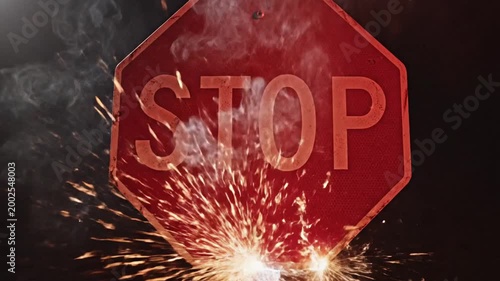 Red Stop Sign with Sparks and Splashes, Dramatic Lighting, Danger Concept
