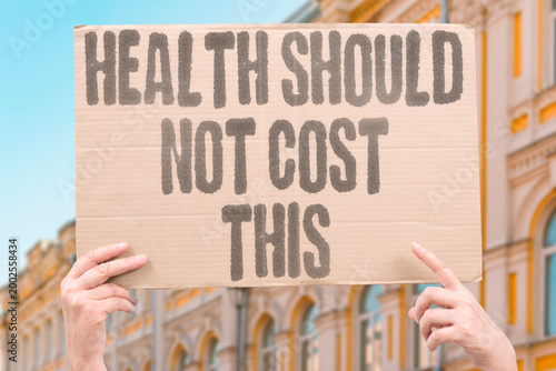 Photography "Health Should Not Cost This" research confirms healthcare costs measurably exceed adult affordable and reasonable levels