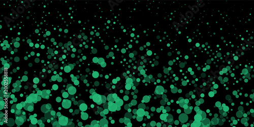 Abstract green bokeh particles floating on dark background. Modern digital effect with glowing circles, perfect for tech and futuristic themes.