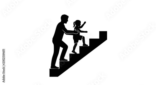 Silhouette of a father helping his young daughter climb up a flight of stairs.