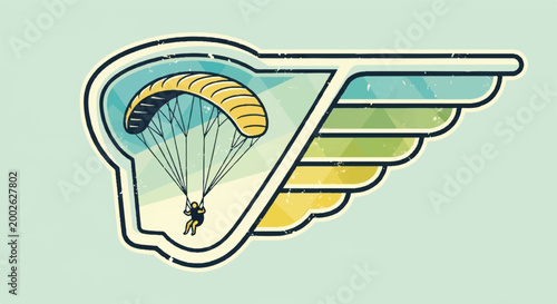Paragliding emblem with yellow canopy and wing symbol on green background