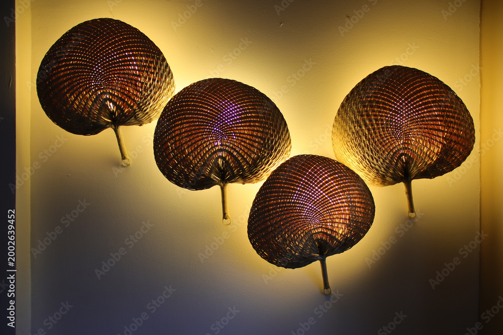 Fototapeta premium wicker fans in a room in siem reap in cambodia 