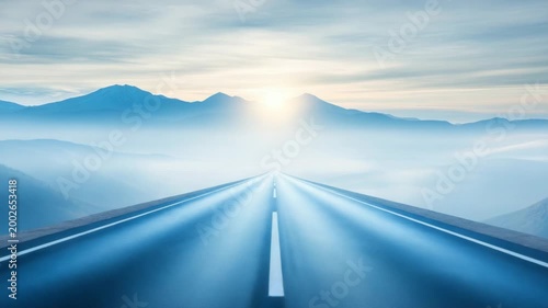 A long, straight road leads through misty mountains towards a bright sunrise. This serene landscape symbolizes a hopeful journey into the future.
