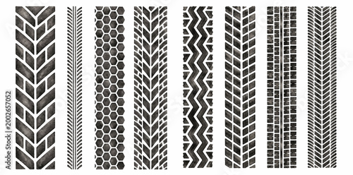 A watercolor set of tire tracks featuring black wheel tread strips with geometric automotive textures in a distressed industrial style.