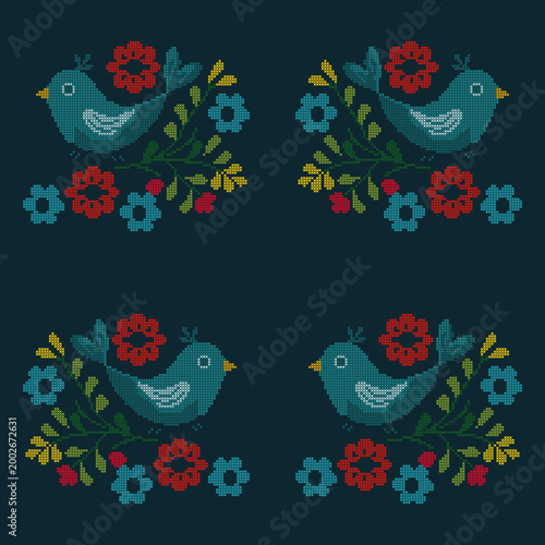 Cross stitch embroidery pattern with blue birds and colorful flowers on dark background. Folk art floral vector illustration in needlework style.