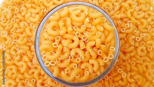 Elbow Macaroni Pasta Rotating Background, Uncooked Elbow Macaroni Pasta Ingredient, Food Background
