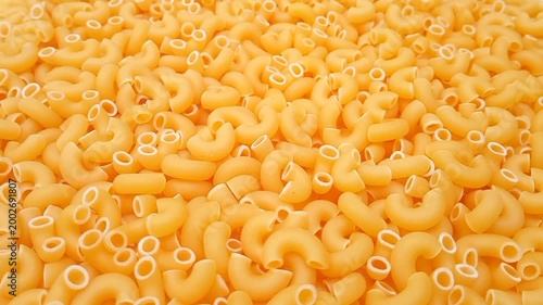 Elbow Macaroni Pasta Rotating Background, Uncooked Elbow Macaroni Pasta Ingredient, Food Background