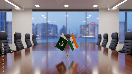  Business meeting table with Pakistan and India flags in modern conference room