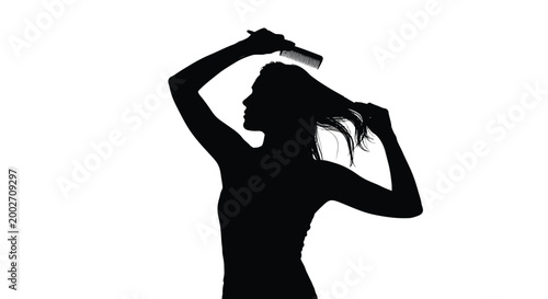 Woman combing her long hair with a wide-tooth comb in a stylish pose