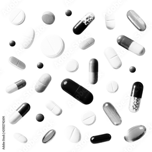 Halftone dotted pills and capsules pattern in monochrome minimal style, representing medicine, pharmacy, healthcare and treatment concept isolated on white background.