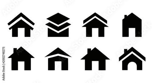 Collection of simple house icons in black.