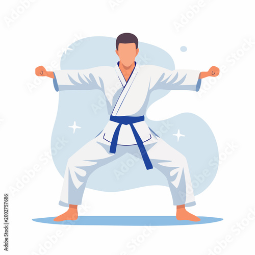 Karate practitioner in white gi with blue belt performing a stance
