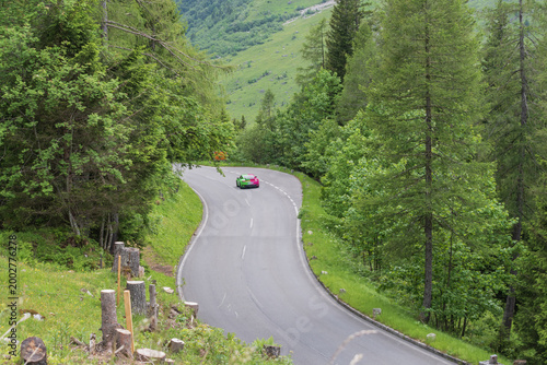 Photography Sports car on Grossglockner High Alpine Road in Austria with alpine mountain lan