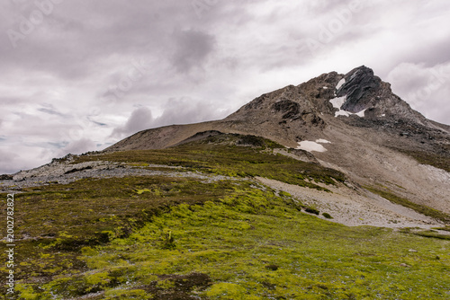 Sharp rocky mountain ridge under a gray sky in the remote wilderness of southern Argentina