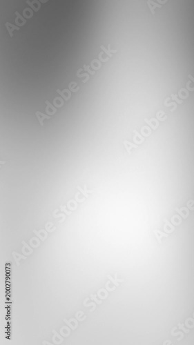 A calming abstract background featuring a smooth gray silver gradient with subtle variations in light tones.	
