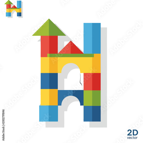 A colorful letter shaped like a small castle made of plastic building blocks