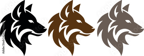 Three stylized wolves heads in black brown and gray colors