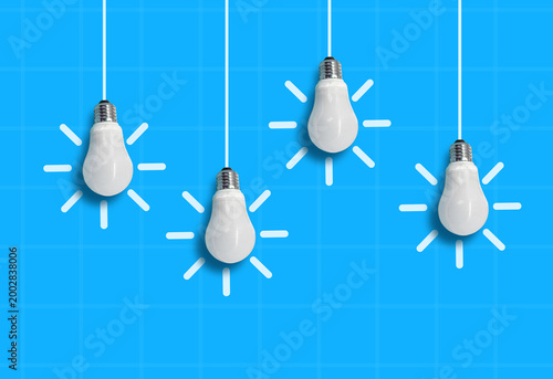 Glowing Hanging Light Bulb, business idea concept on isolated background	
