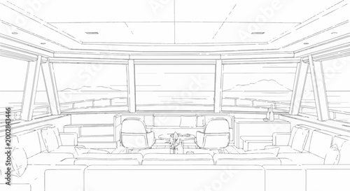 Luxury yacht interior seating, table, windows overlooking sea and mountains