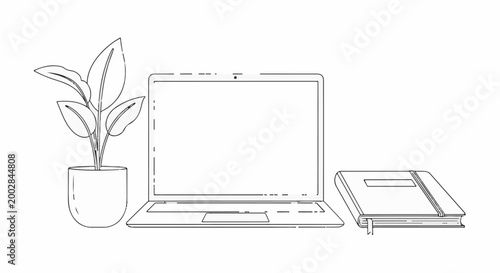 Minimalist desk setup with a potted plant, open laptop, and closed notebook