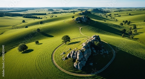 Rolling Green Hills with Rocky Outcrop and Winding Path.