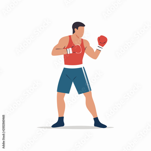 Boxer in fighting stance with red gloves and blue shorts