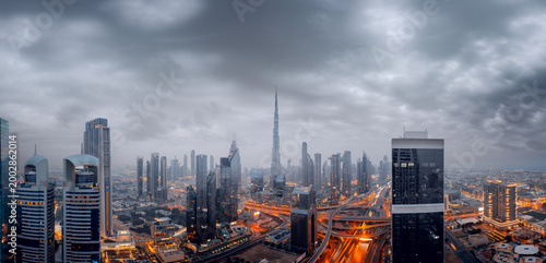 Photos Cinematic panoramic view of the Dubai skyline and Burj Khalifa under dramatic st