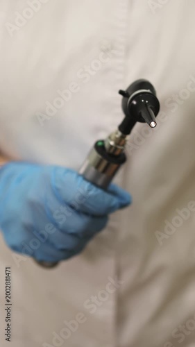 Doctor's appointment.Otoscope. Slow motion. High quality 4k footage