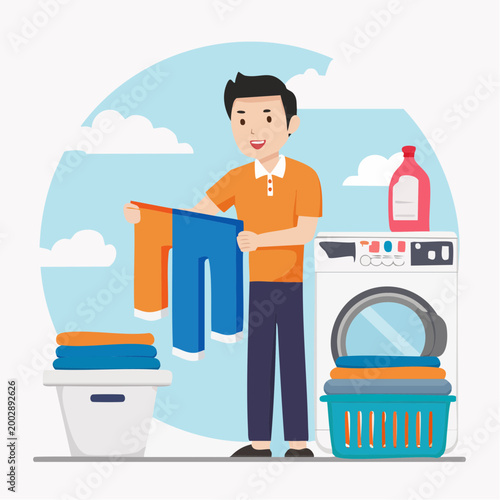 Man Doing Laundry with Washing Machine and Clothes Basket