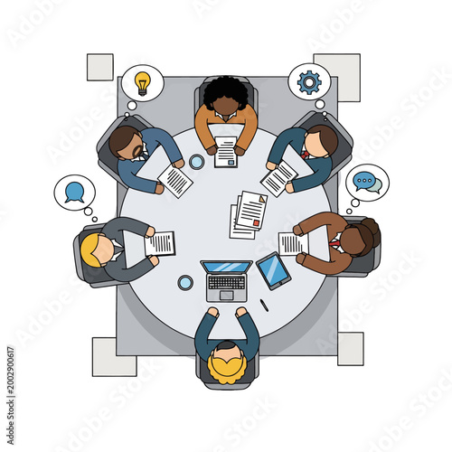 Diverse group of professionals collaborating around a circular table during