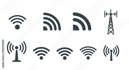 Set of wireless signal icons and transmission towers in black vector style.
