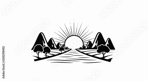Silhouette of mountains, sun rising, and a path leading to the horizon