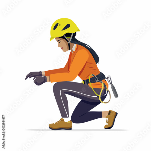 Woman in climbing gear preparing for activity