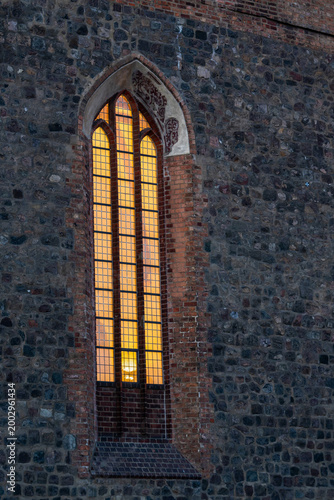 Canvas Print exterior view of an enlightened gothic window of the historic St