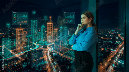 Businesswoman analyzing smart city data visualization over urban skyline at night