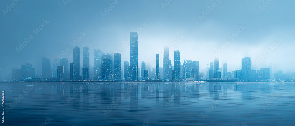 Fototapeta premium Futuristic city panorama with skyscraper silhouettes reflected over water in deep blue fog. Dystopian dreamy atmosphere for tech, AI brand backgrounds, and urban concept projects.
