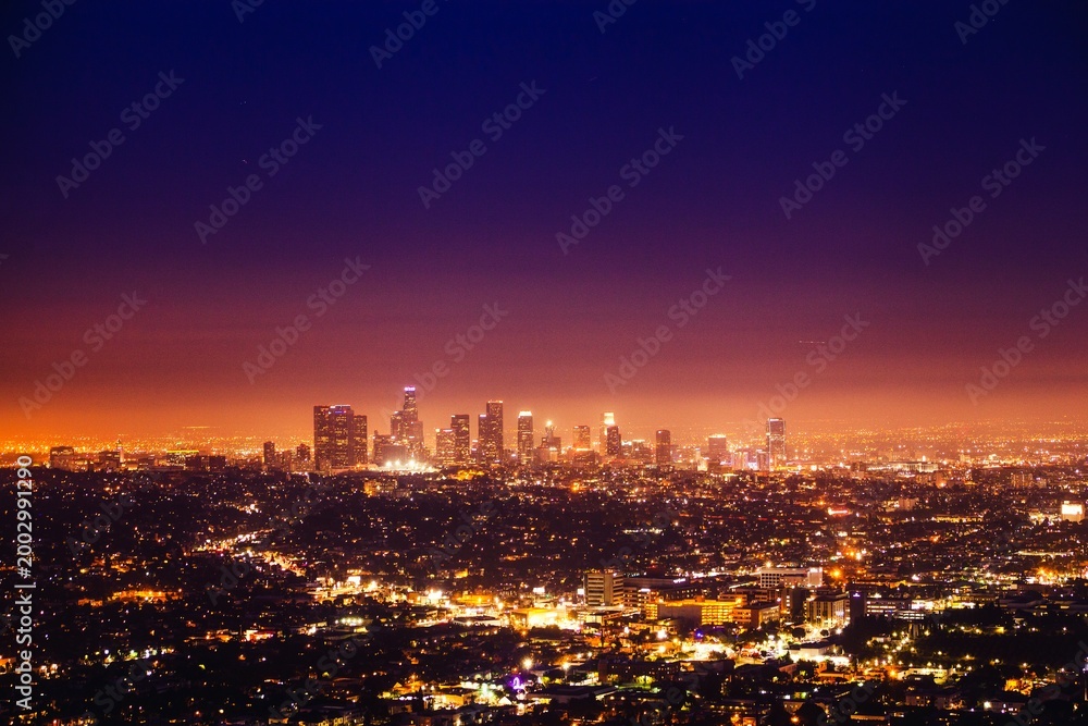 Fototapeta premium Los angeles dazzling city lights illuminating night skyline