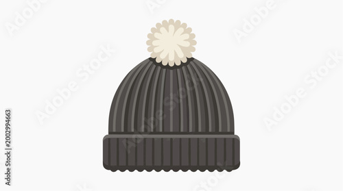 A knitted cap with a fluffy pom-pom. A perfect accessory for staying warm and stylish during winter.