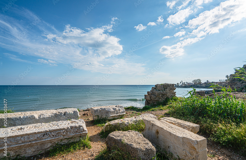 Fototapeta premium The scenic views of the ancient city of Side, one of the best-known classical sites in the country, include statues, theater, agora, nymphaeum, bath, and a colonnaded street in Hellenistic, Roman, an