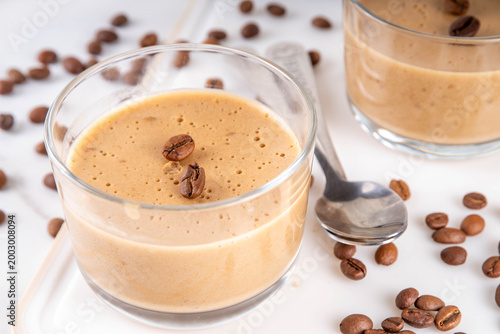 Φωτογραφία Italian coffee latte mousse dessert, whipped semifreddo souffle or pudding in po