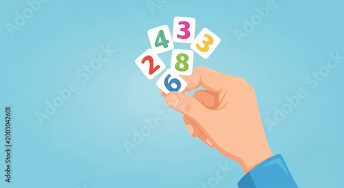 Hand holding colorful number tiles.